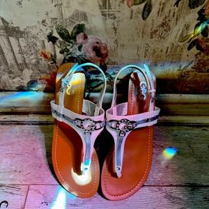 GUESS GBG white and silver sandals.